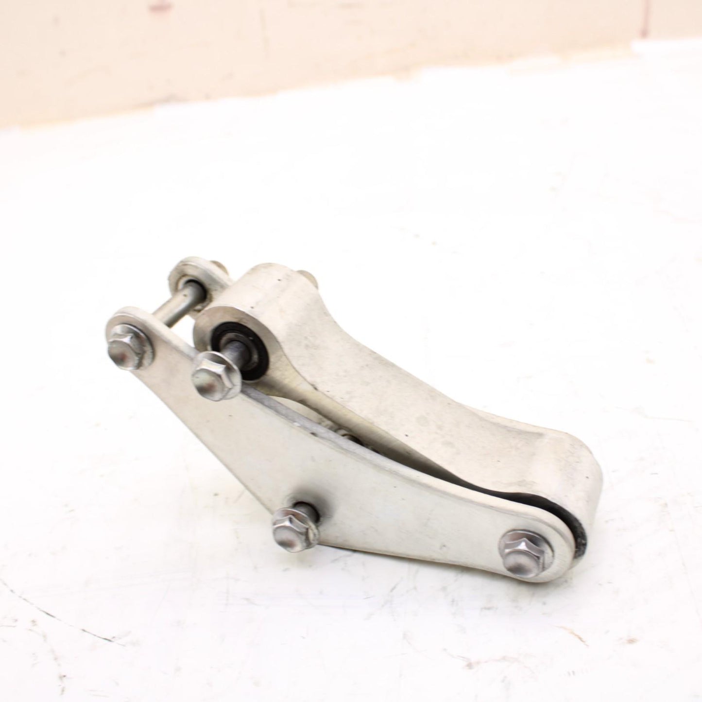 2011 - 2015 KAWASAKI NINJA ZX10R DOG BONE REAR SHOCK LINKAGE SILVER STOCK OEM