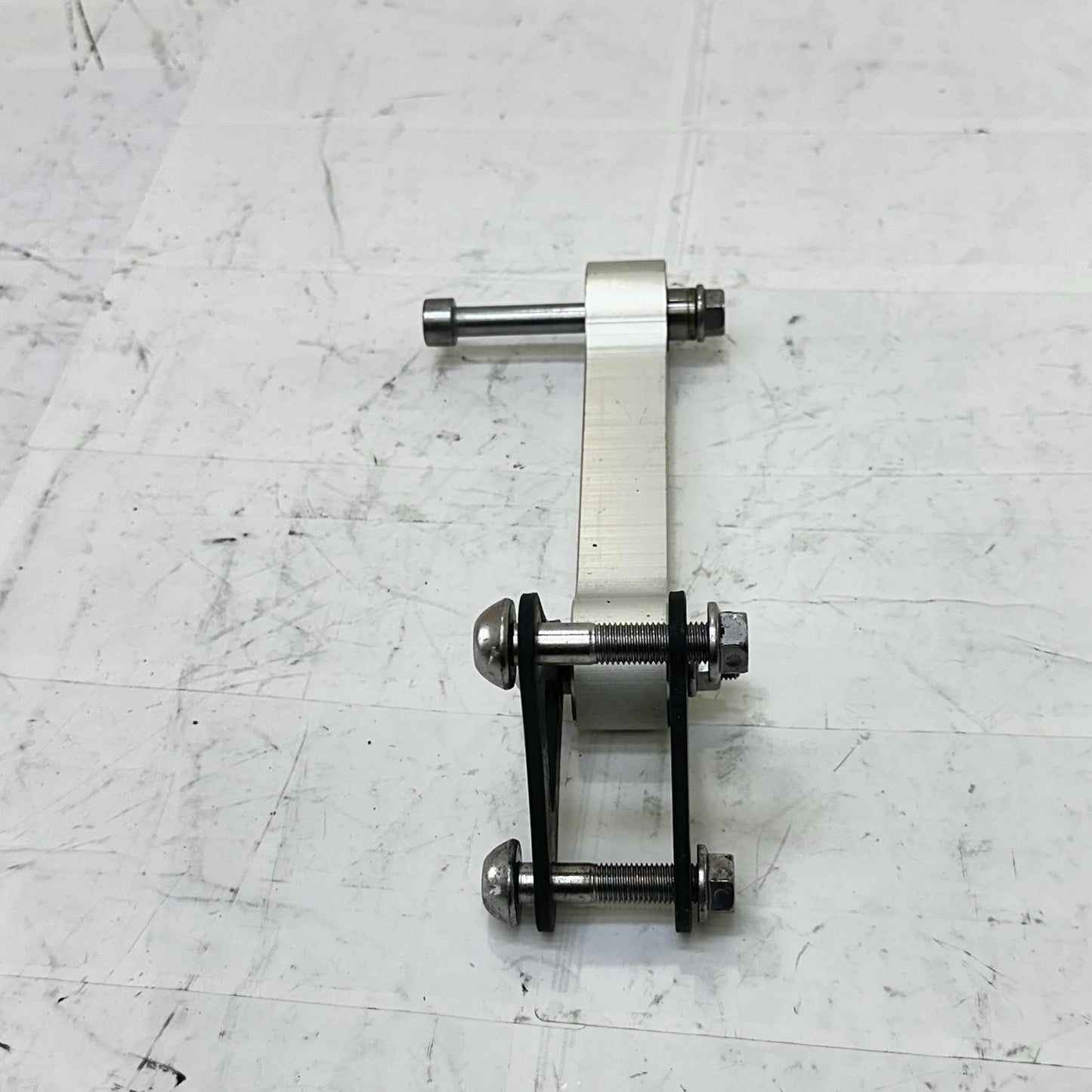 2013 - 2017 TRIUMPH DAYTONA 675 DOG BONE REAR SHOCK LINKAGE BACK BRACKET OEM