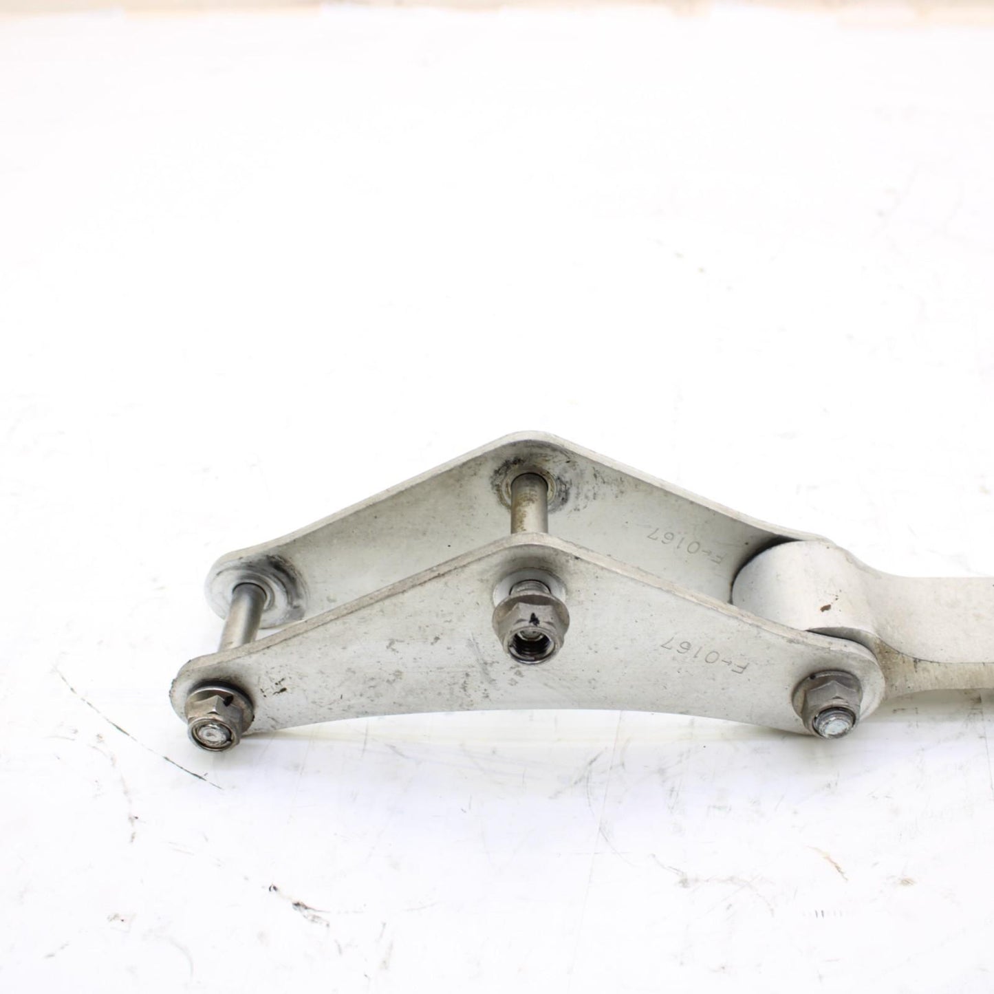 2011 - 2015 KAWASAKI NINJA ZX10R DOG BONE REAR SHOCK LINKAGE SILVER STOCK OEM