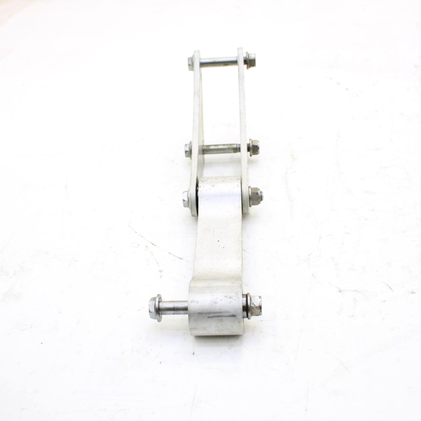 2011 - 2015 KAWASAKI NINJA ZX10R DOG BONE REAR SHOCK LINKAGE SILVER STOCK OEM