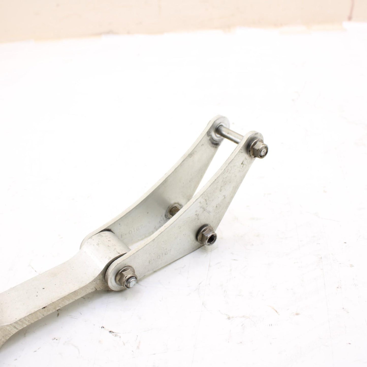 2011 - 2015 KAWASAKI NINJA ZX10R DOG BONE REAR SHOCK LINKAGE SILVER STOCK OEM