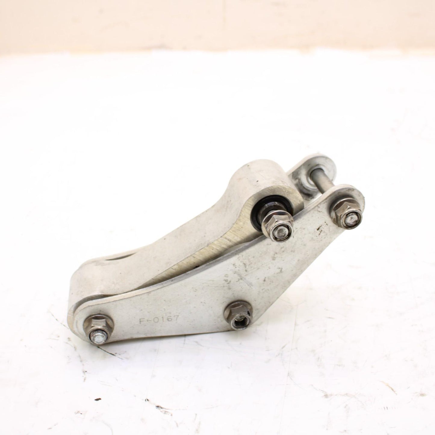 2011 - 2015 KAWASAKI NINJA ZX10R DOG BONE REAR SHOCK LINKAGE SILVER STOCK OEM