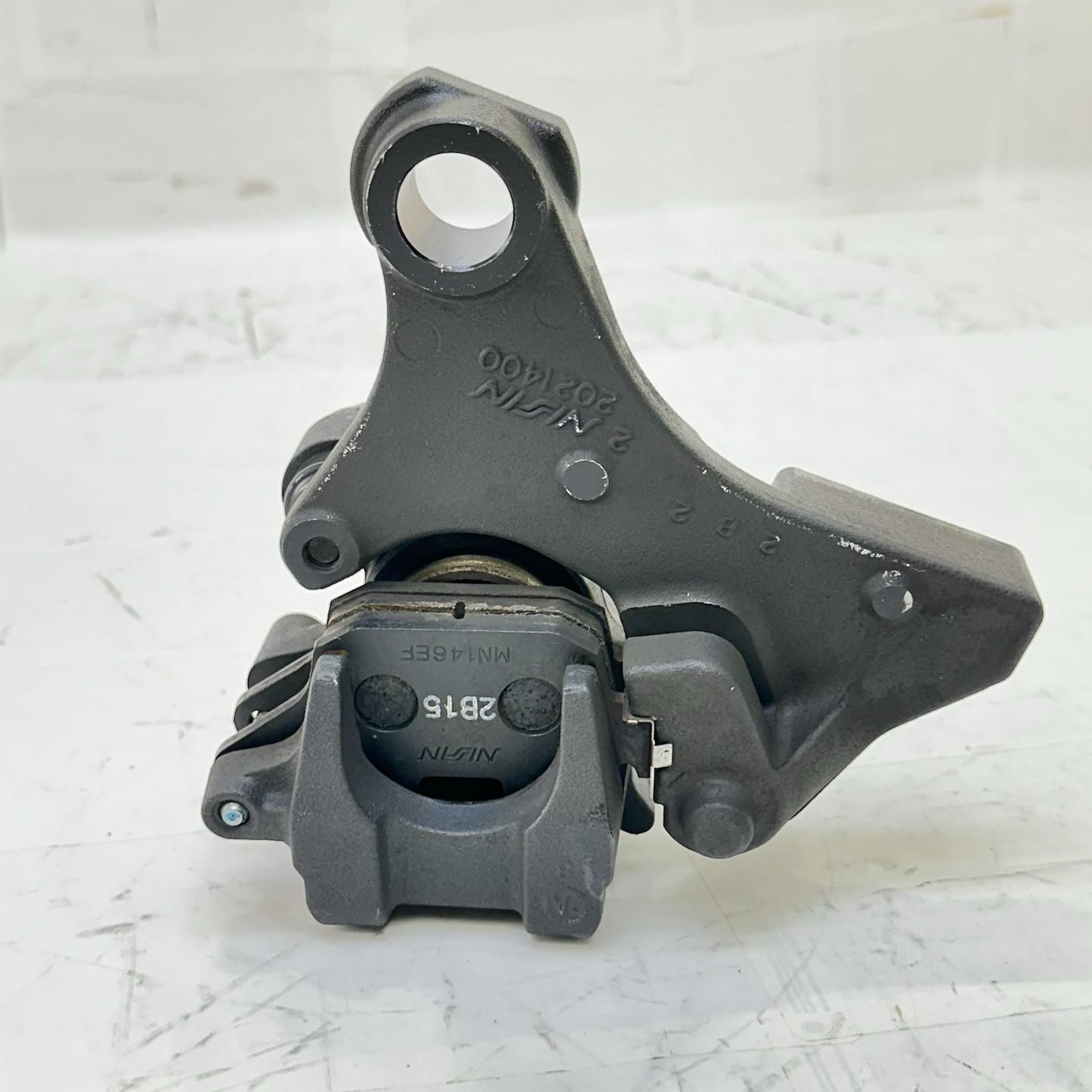 2013 - 2017 TRIUMPH DAYTONA 675 REAR BRAKE CALIPER BACK WHEEL BRACKET MOUNT OEM