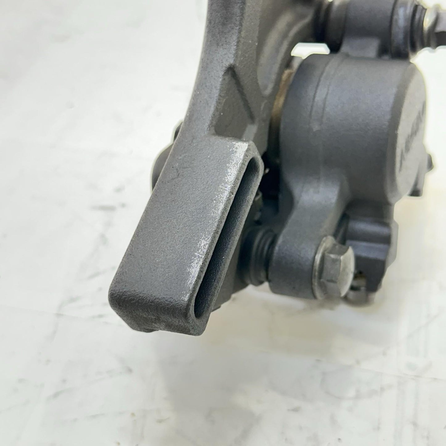 2013 - 2017 TRIUMPH DAYTONA 675 REAR BRAKE CALIPER BACK WHEEL BRACKET MOUNT OEM