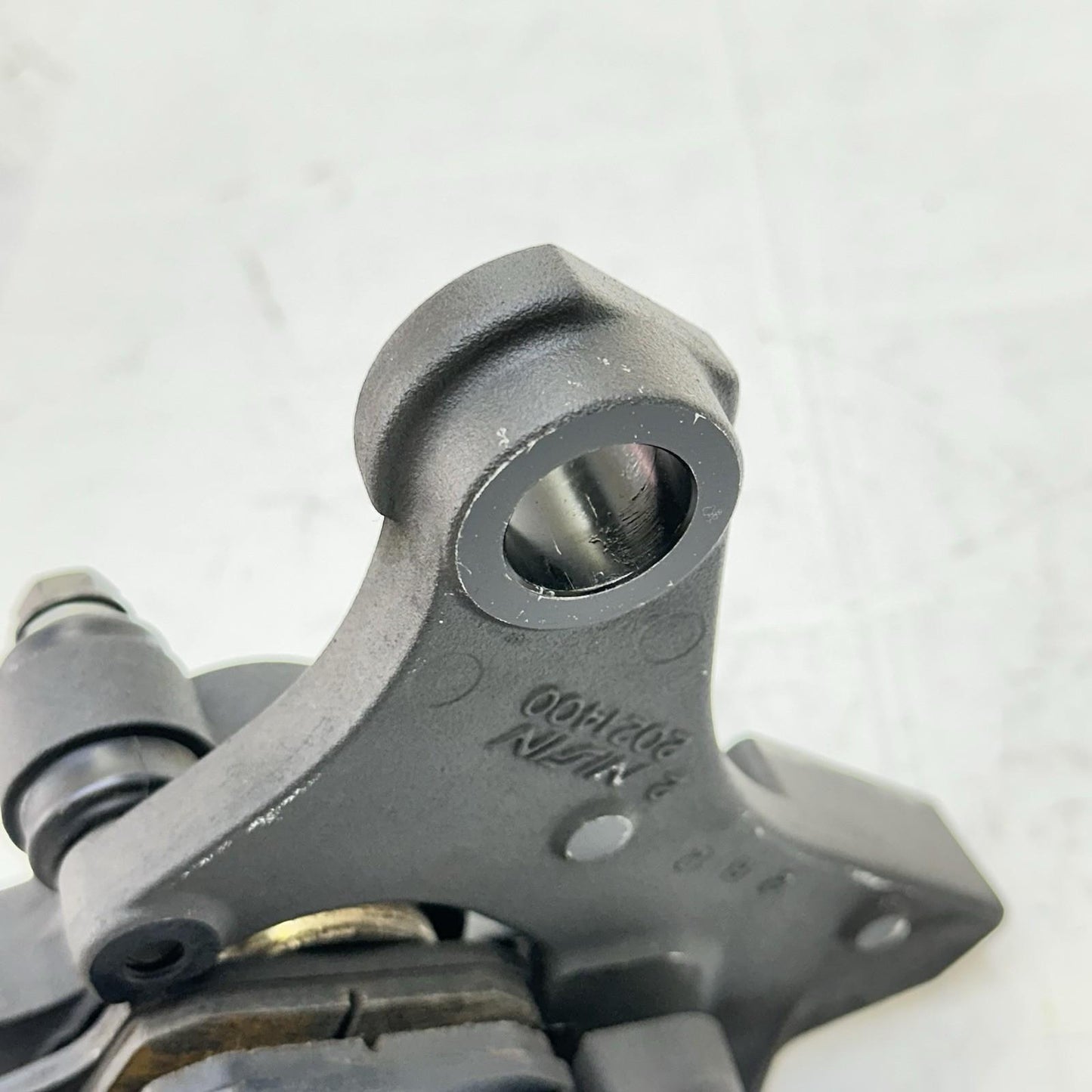 2013 - 2017 TRIUMPH DAYTONA 675 REAR BRAKE CALIPER BACK WHEEL BRACKET MOUNT OEM