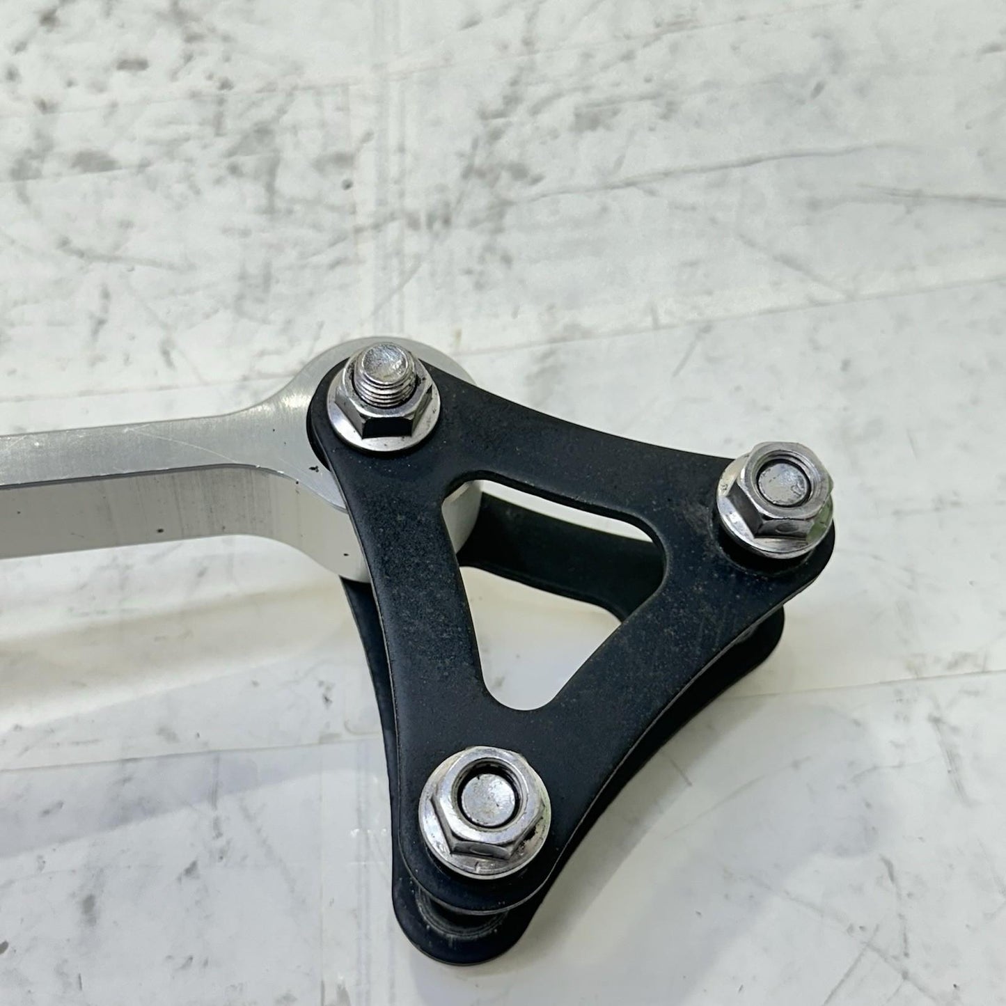 2013 - 2017 TRIUMPH DAYTONA 675 DOG BONE REAR SHOCK LINKAGE BACK BRACKET OEM