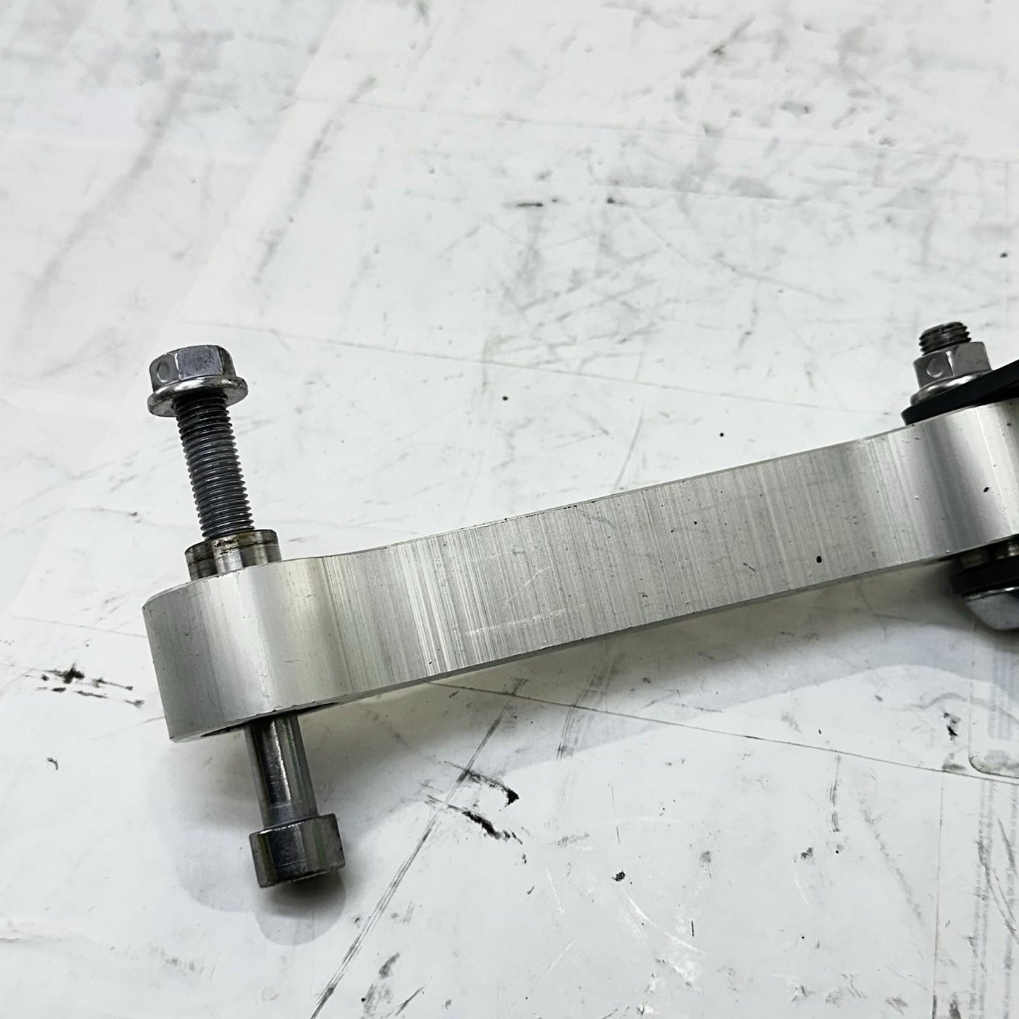 2013 - 2017 TRIUMPH DAYTONA 675 DOG BONE REAR SHOCK LINKAGE BACK BRACKET OEM