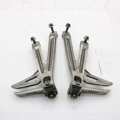 2009 - 2012 TRIUMPH DAYTONA 675 PASSENGER PEGS REAR FOOT PEGS SILVER Genuine