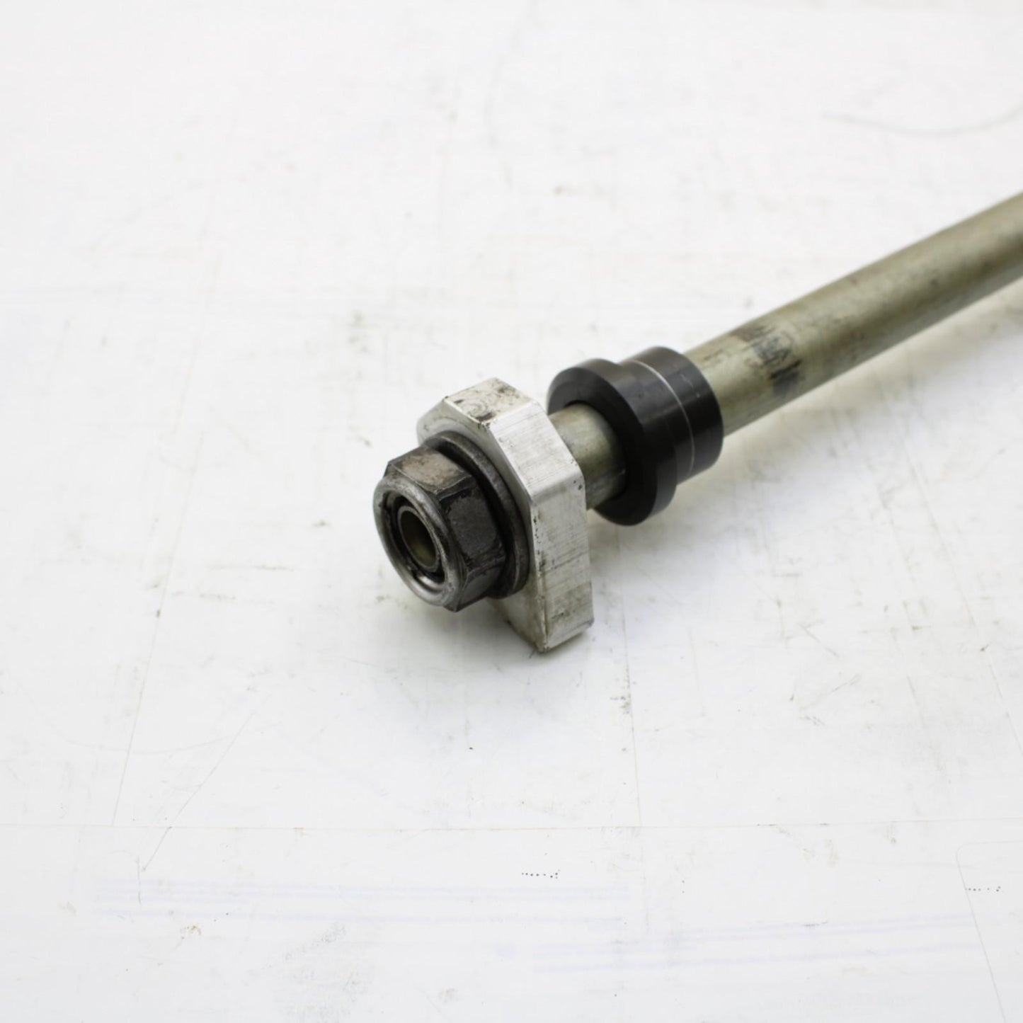 2009 - 2012 TRIUMPH DAYTONA 675 R REAR AXLE BOLT NUT Bolt & Spindle STOCK SILVER