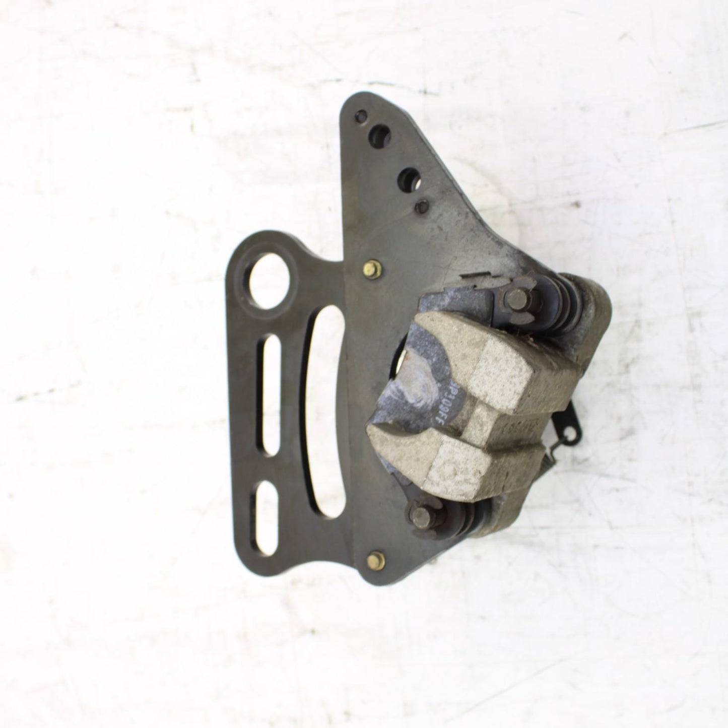 2008 CAN-AM SPYDER REAR BRAKE CALIPER W/ PARKING BRAKE MOUNT BRACKET