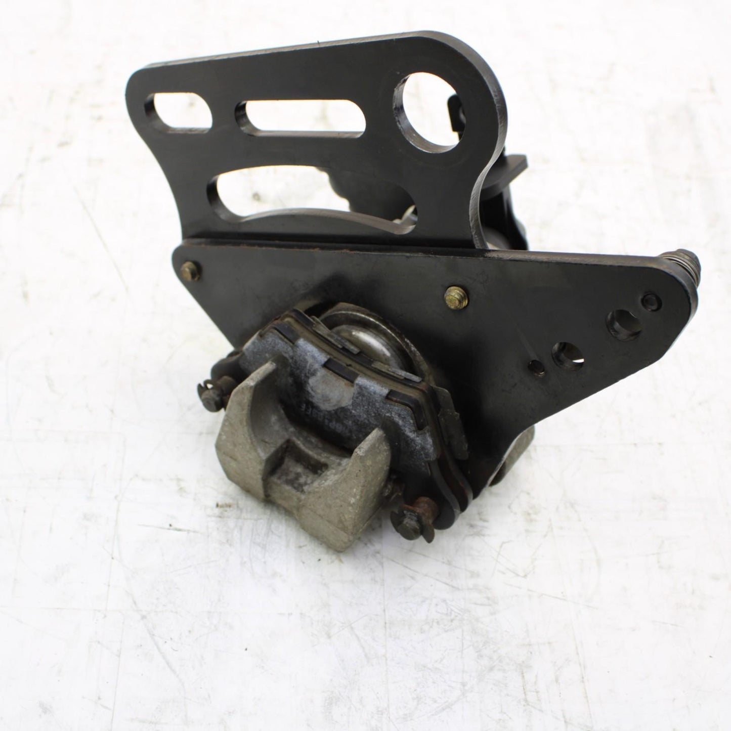 2008 CAN-AM SPYDER REAR BRAKE CALIPER W/ PARKING BRAKE MOUNT BRACKET