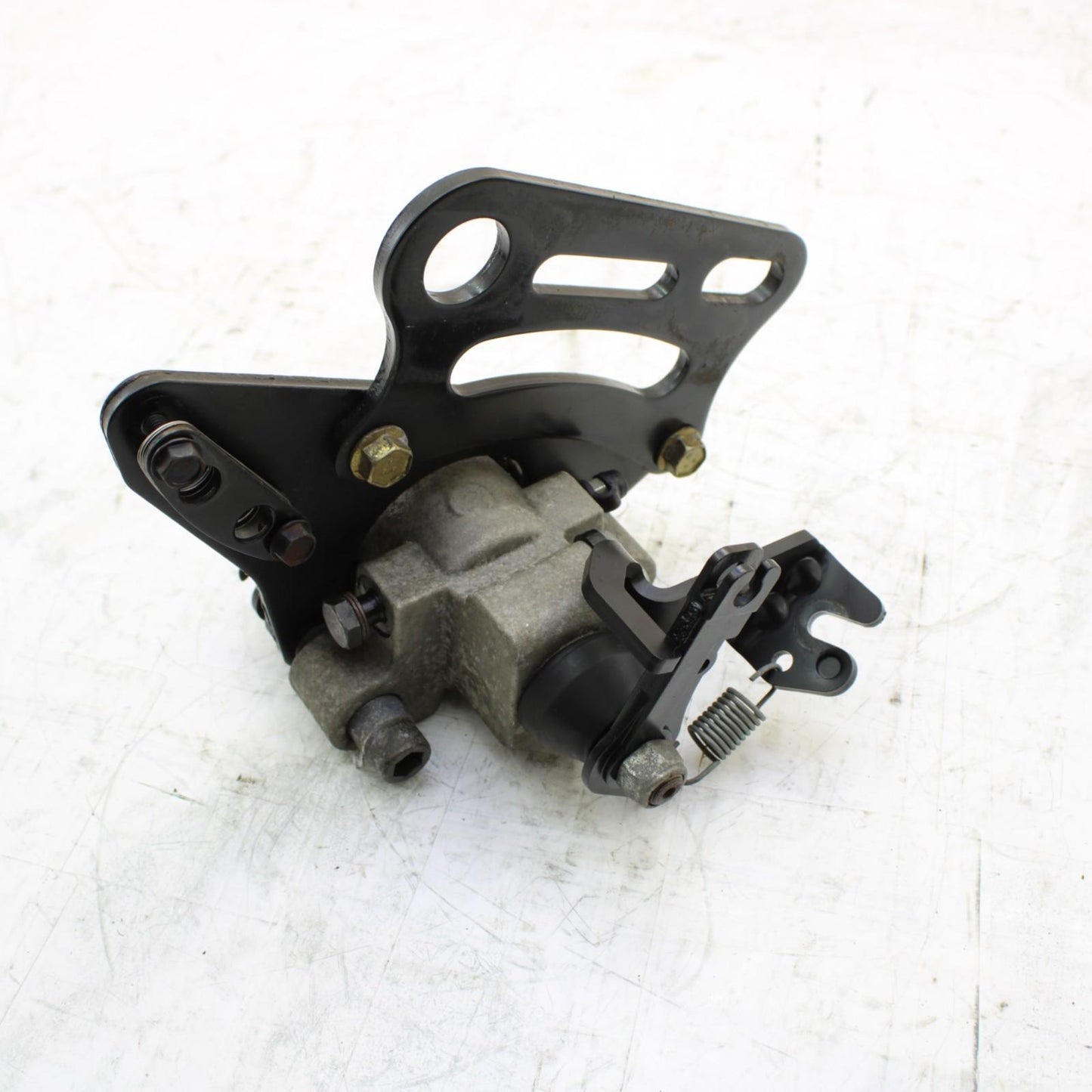 2008 CAN-AM SPYDER REAR BRAKE CALIPER W/ PARKING BRAKE MOUNT BRACKET