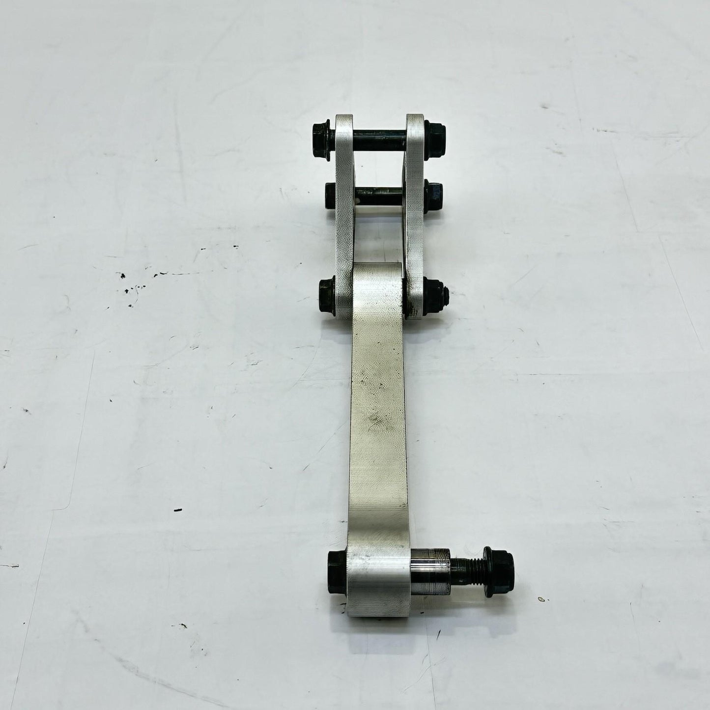 2003 - 2005 YAMAHA YZF R6 DOG BONE REAR SHOCK ABSORBER LINKAGE SILVER STOCK