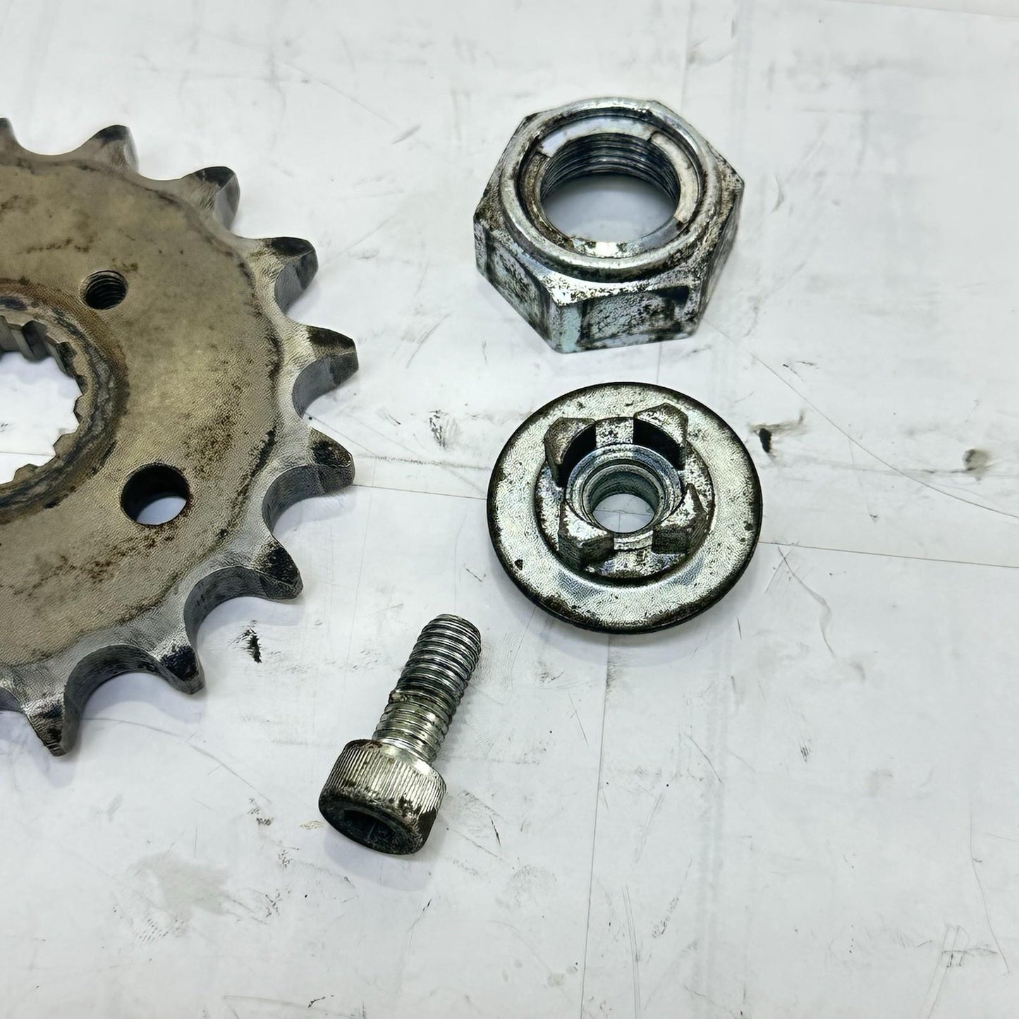 2007 - 2008 SUZUKI GSXR 1000 FRONT SPROCKET GEAR NUT BOLT SPEED SENSOR ROTOR